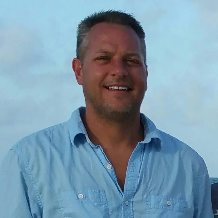 Mark Wolfe, owner of Joplin Mold Inspection and Remediation, smiling outdoors
