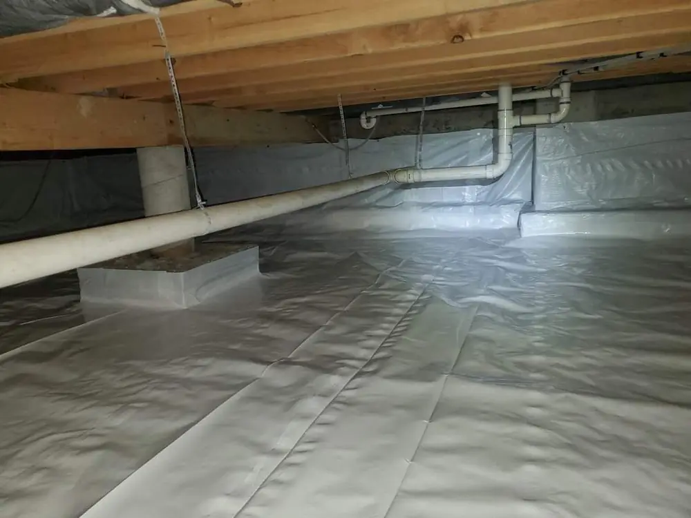 Finished crawlspace encapsulation with a bright white vapor barrier